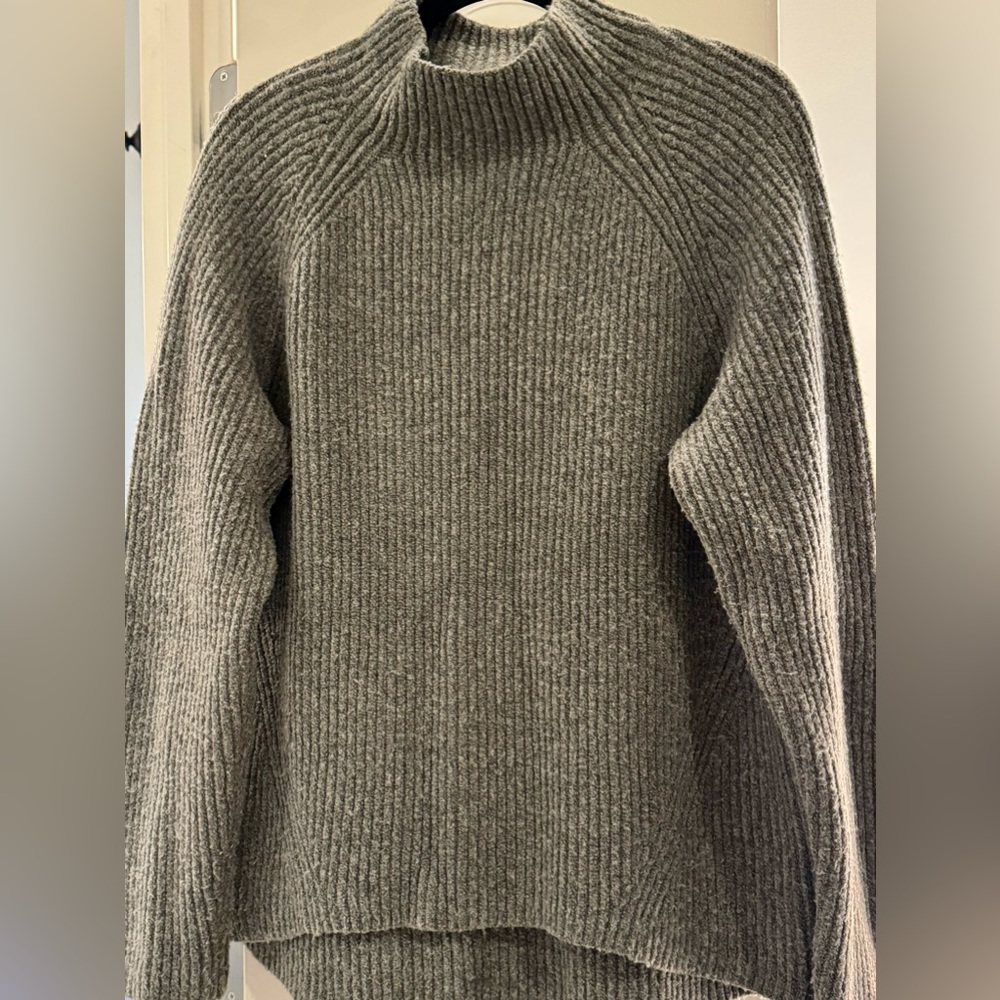 Madewell grey sweater longer in back than front.